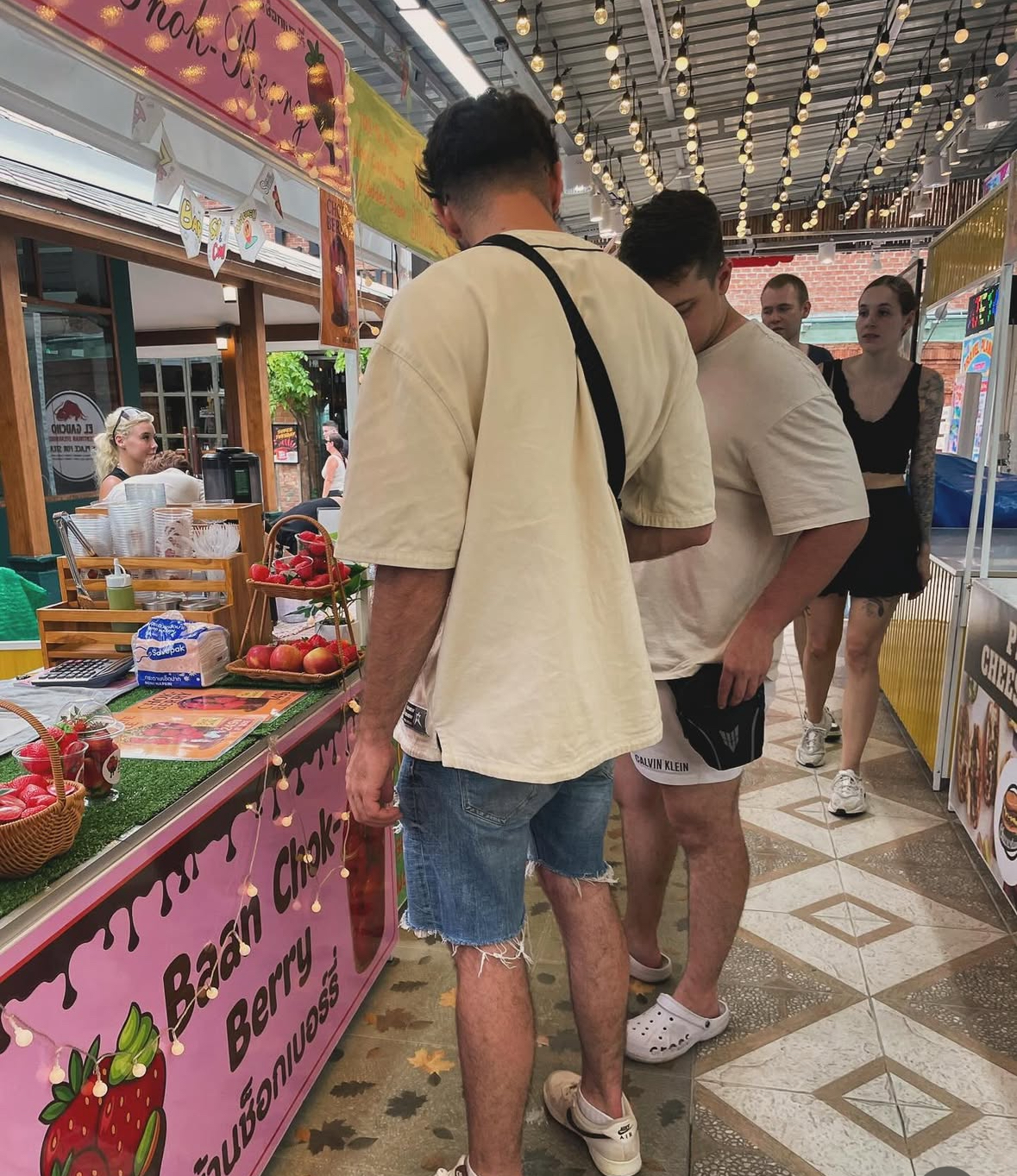 Customers at Baan Chok-Berry stall night market